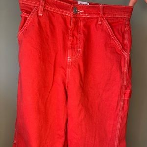red cargo jeans